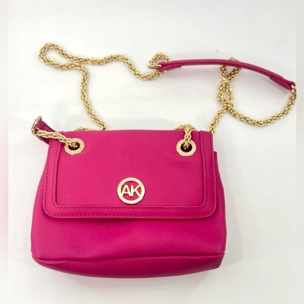 Anne Klein hot pink crossbody bag with gold chain strap and front flap w/ emblem